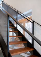 The staircase, made of steel with treads of cherry harvested from the site, was a collaboration with Flywheel Industrial Arts in Montpelier, Vermont. "It's a piece of art to some extent,