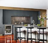 Kitchen, Cooktops, Wine Cooler, and Ceiling Lighting  Photo 2 of 7 in Contemporary Home With Colorful Hues by Angelica Angeli