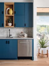 Blue shades create a moody effect in the large butler’s pantry.