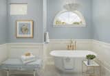 Soft colors create a calm, soothing ambiance in the bathroom.