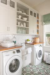 Built-ins and plenty of shelves keep the laundry room organized.