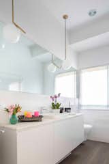 Neutral palette creates a serene, spa-like bathroom
  Photo 7 of 18 in Southampton Modern Farmhouse by Angelica Angeli