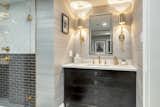 Basement bathroom with exquisite vanity and shower