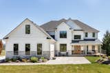 Timeless exterior with farmhouse warmth and panoramic views