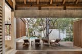 Dining, Concrete, Bench, Ceiling, Chair, and Medium Hardwood  Dining Concrete Ceiling Bench Photos from Jungle Keva