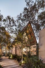 Exterior, A-Frame, Cabin, Wood, Concrete, and Stucco  Exterior A-Frame Stucco Photos from Jungle Keva