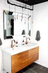 Vintage mirror, ikea vanity with semihandmade fronts in master bath