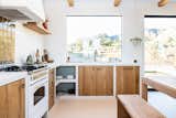 Kitchen, Dishwasher, Range, Wood Cabinet, and Drop In Sink Finca style kitchen  Photo 4 of 14 in Desert Wild Joshua Tree by Louis Litrenta