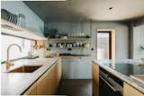Recycled Altrock work surfaces and larch cabinetry define the kitchen design.  Photo 7 of 10 in 10 Renovations Featuring Sensational Kitchens from Guthens