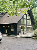 The exterior was stained black and lighting was updated.