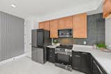 Kitchen featuring LG Appliances and Samsung Bespoke Refrigerator.