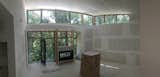 Living Room, Two-Sided Fireplace, and Gas Burning Fireplace Living Room Pano  Photo 13 of 21 in Hillside House by Garrett Cook