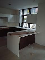 Kitchen, Wood Cabinet, and Porcelain Tile Floor Kitchen  Photo 18 of 21 in Hillside House by Garrett Cook