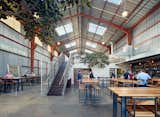 The Southern Pacific Brewery in San Francisco is housed in a former machine shop at the termination of an old train line. The spacious shell considers all the functional needs of the client, which included running a bar, restaurant, and full production brewery.