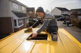 Charlie preps the roof of the van for the new skylight.  Photo 5 of 22 in Budget Breakdown: A Climbing Couple Turn a Delivery Van Into an Adventure Mobile for $8.5K