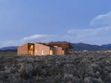 On a five-acre property outside Taos, New Mexico, designer Molly Bell worked closely with her father, builder Ed Bell, to create a new residence for owner Lois Rodin. "Lois requested that it appear as a grouping of individual masses, so that it read more like a cluster than a solitary shape," Molly says. "I hope it shows that it’s OK to do something modern in such a traditional environment, and not to be afraid of it."&nbsp;&nbsp;