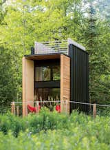Architect Bill Yudchitz asked his son, Daniel, to help him create this self-sustaining multi-level family cabin in Bayfield, Wisconsin.