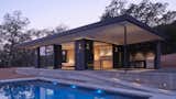 The concrete-lined pool measures 16'x38'.  Photo 7 of 11 in A Chunk of Volcanic Stone Inspires a Rock-Solid Sonoma Home