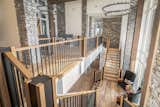 To create symmetry within the entryway, the staircase was designed to have an entrance point from both wings of the home.   Photo 5 of 15 in Vista Point by Dean Thomas Design Group