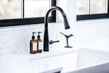 Kitchen, Engineered Quartz Counter, Subway Tile Backsplashe, White Cabinet, and Drop In Sink Kitchen Sink  Photo 5 of 32 in Frost by Mackenzie Reynolds