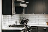 Kitchen, Subway Tile Backsplashe, Engineered Quartz Counter, Colorful Cabinet, Range, Cooktops, and Range Hood Kitchen  Photo 12 of 42 in Avenue Stone by Mackenzie Reynolds
