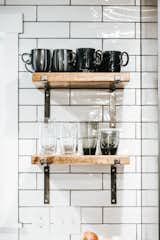 Kitchen, Subway Tile Backsplashe, and Wood Cabinet Open Shelving in Kitchen
  Photo 11 of 42 in Avenue Stone by Mackenzie Reynolds