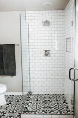 Bath Room, Subway Tile Wall, Concrete Floor, Corner Shower, and Enclosed Shower Master Shower  Photo 14 of 42 in Avenue Stone by Mackenzie Reynolds
