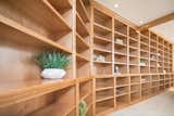 Office, Library Room Type, Storage, Desk, Bookcase, Carpet Floor, and Shelves Library  Photo 10 of 10 in Mocking Bird by Mackenzie Reynolds
