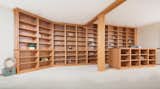 Office, Desk, Bookcase, Carpet Floor, Library Room Type, and Storage Library  Photo 9 of 10 in Mocking Bird by Mackenzie Reynolds