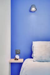 Bedroom, Bed, and Wall Lighting Klein blue wall in the parents bedroom  Photo 14 of 18 in La Grande Bleu by HOCH studio