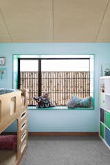 The feature walls in the children’s bedrooms in the upstairs addition are painted using British Paints Waterflow 316.  Photo 8 of 14 in A Bold Blue Extension Caps a Weatherboard Cottage in Melbourne