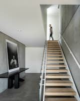 "The floating stairs are a subtle nod to the legendary Mies van der Rohe," says the architect.