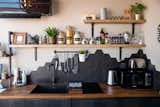 The kitchen features oak woodwork, black fixtures and fittings, and black hexagonal tiles that mimic the lines of the local landscape and represent the "basalt columns and moodiness of Iceland".