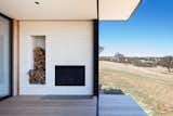 The outdoor fireplace is one of the defining features of the home.