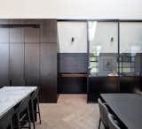 Kitchen and pantry of Park Terrace House by PRau.