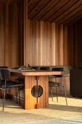 The bespoke dining table was designed by architect Belinda George and crafted using totara timber gifted by the client’s brother. It was made by the same furniture maker who was commissioned by the client’s mother to make a dining table many decades ago.&nbsp;