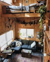Living room and bedroom of Canadian Castaway Off-Grid Cabin.