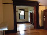 Before: The guest bedroom before the renovation opened into what is now the master bedroom via a sliding door. The two rooms were separated during the renovation.  Photo 24 of 37 in Before & After: A Blighted Boarding House in Sydney Is Now an Adaptable Courtyard Home