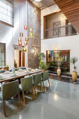Dining room of Pakhaniyil Residence by Nufail Shabana Architects.