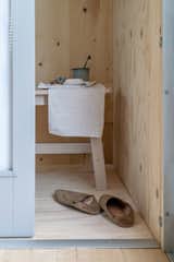 The bathroom is located in a small room adjacent to the main space. If a bathroom isn’t needed, this room can be used for a different purpose.