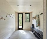 Entry hall of Kahshe Lake Cottage by Solares Architecture.