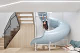 A Powder-Blue Slide Adds Whimsy to This Family-Centric Duplex in Toronto