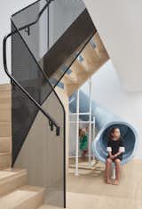 Stair and slide of Walker Residence by Reflect Architecture.
