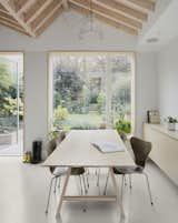 The solid ash dining table was co-designed by Julia and Etch Woodworks to reflect the design language of the cabinetry. It is set up with four chairs for everyday use. If the family has guests, however, it can be rotated 90 degrees, and can fit six people. The window ledge has been designed to double as a bench seat, so there’s no need for additional chairs.