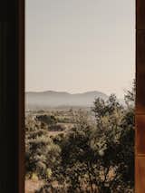 Window view of Casa Ter by Mesura.