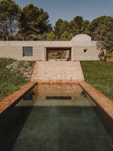 Exterior of Casa Ter by Mesura with pool.