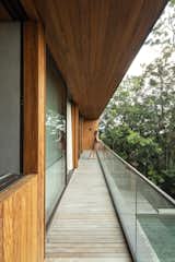 A Coastal Forest Flows Through This Wood-and-Stone Guesthouse in Brazil - Photo 9 of 26 - 