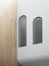Interior windows of Bring to Light Terrace House by Stafford Architecture.