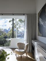 Main bedroom of Bring to Light Terrace House by Stafford Architecture.