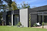 A Concrete-Clad Family Home Rises From the Site of an Old Tennis Court in Australia - Photo 12 of 14 - 